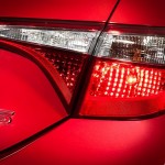new-2014-toyota-corolla-teased-in-red-photos-from-toyota-canada-medium_1