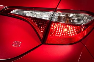new-2014-toyota-corolla-teased-in-red-photos-from-toyota-canada-medium_1