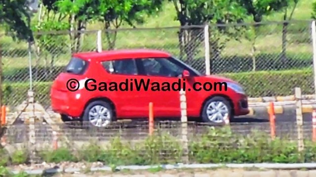 Maruti-Swift-facelift-spied-India-red-side