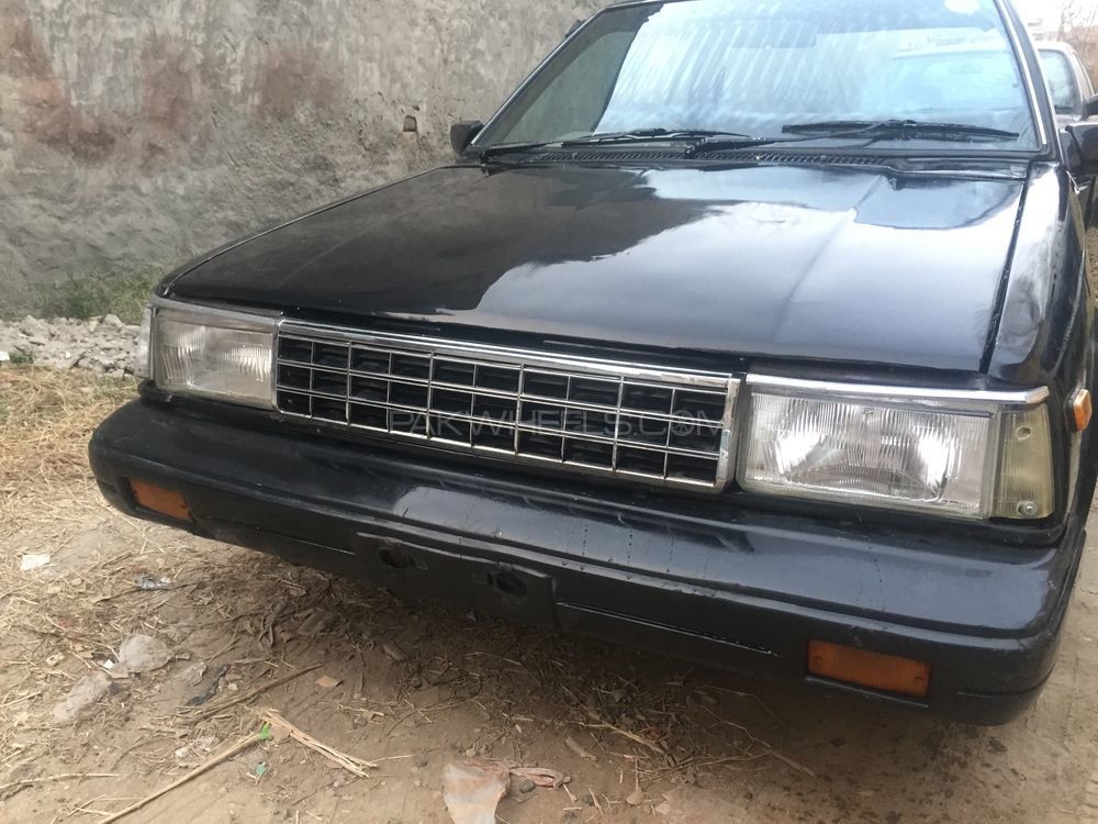 nissan-sunny-1-3-executive-saloon-m-t-1984-20916282 - PakWheels Blog