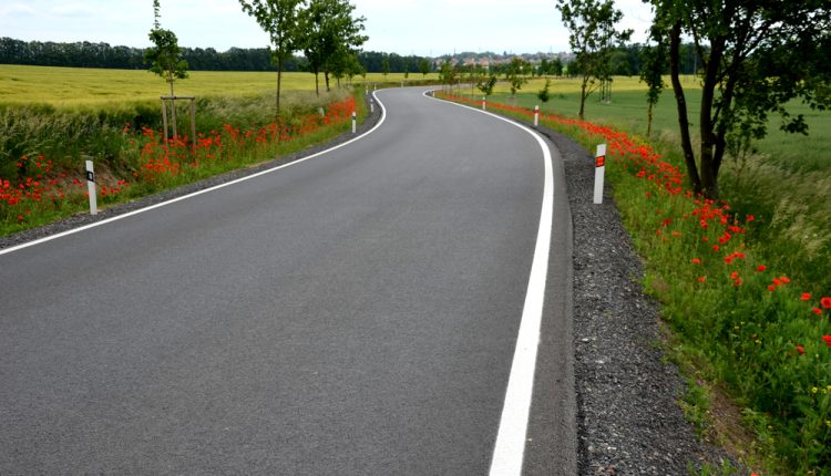 A,New,Asphalt,Road,With,A,White,Line,On,The
