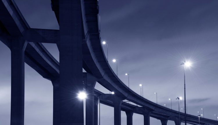 Elevated,Highway,Or,Bridge,At,Night